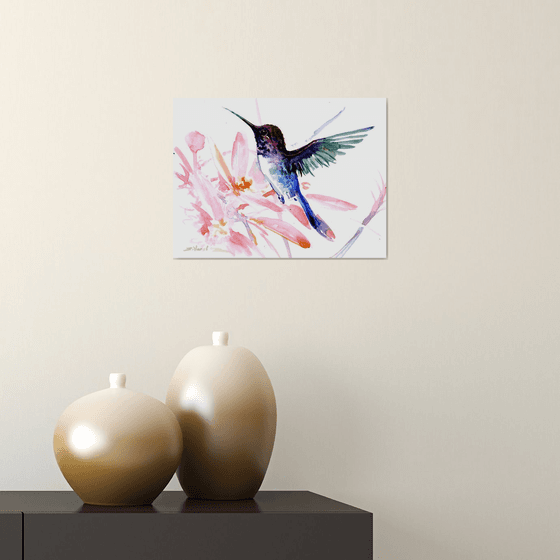 Flying Hummingbird and Flowers