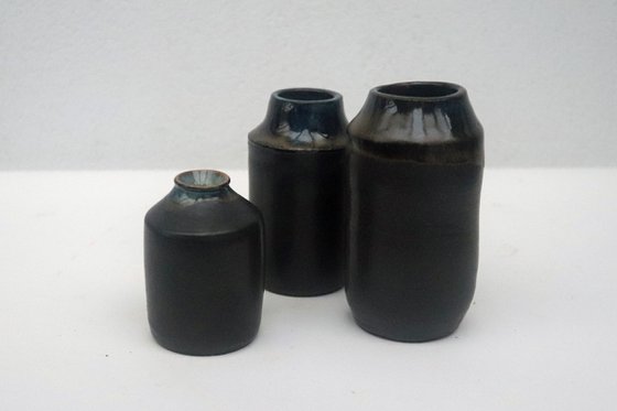 Three Little Black Vessels.