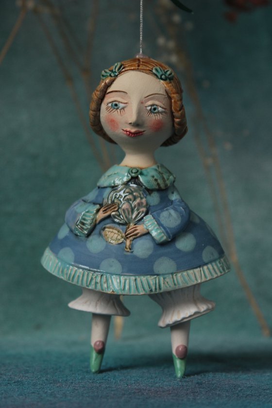 Little Girl in tender blue dress. Hanging sculpture, bell doll by Elya Yalonetski