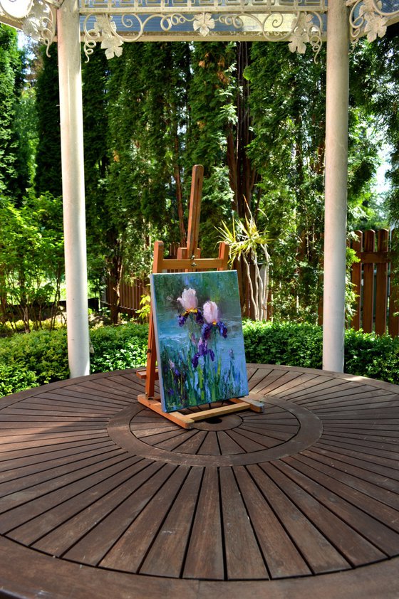 Three Irises by the pond