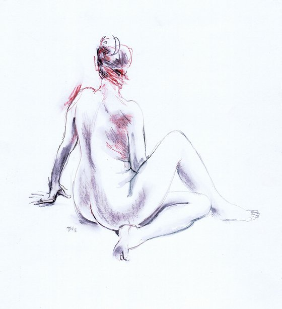 Nude seated on floor, back view