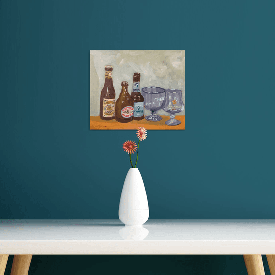 Belgian beer bottles and glasses, a still life oil painting.