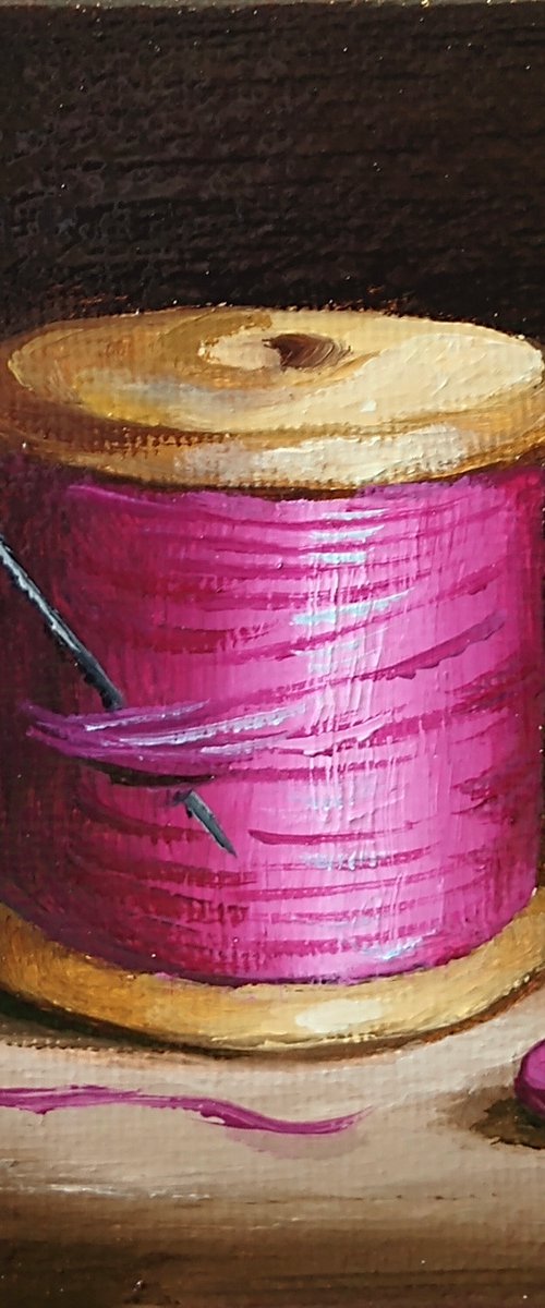 Little pink  cotton reel with button still life by Jane Palmer Art