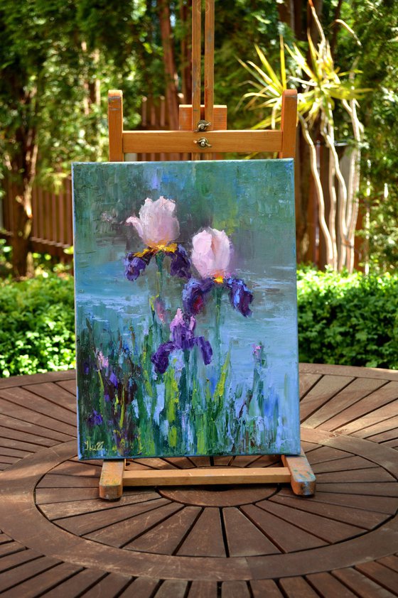 Three Irises by the pond