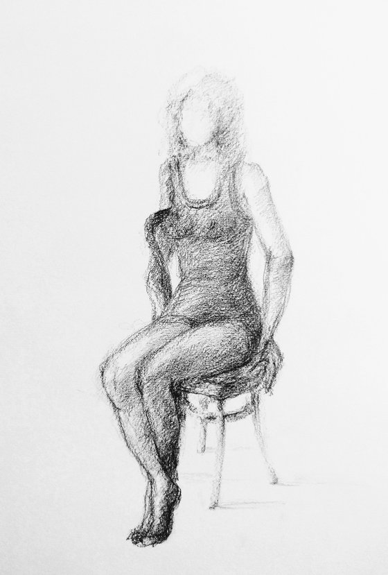 Model #2. Drawing with a pencil on paper.