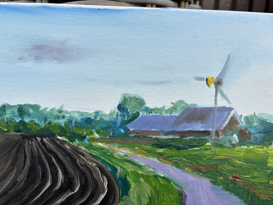 Plowed field, road and windmill . Plein Air