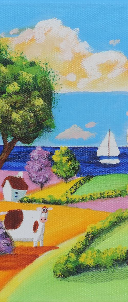 Cow rolling hills seaside by Gordon Bruce