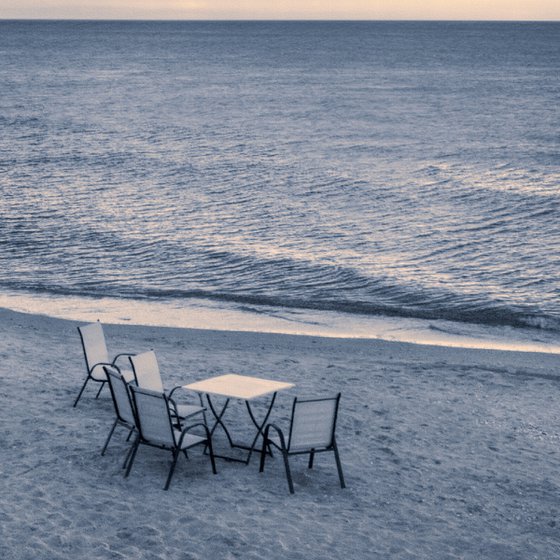 There are many empty seats in the coastal cafe before the storm.