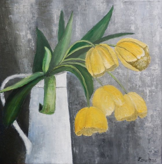 Still life with yellow tulips