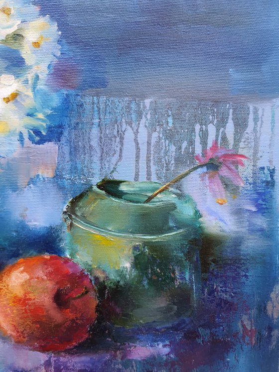 Red apples on blue