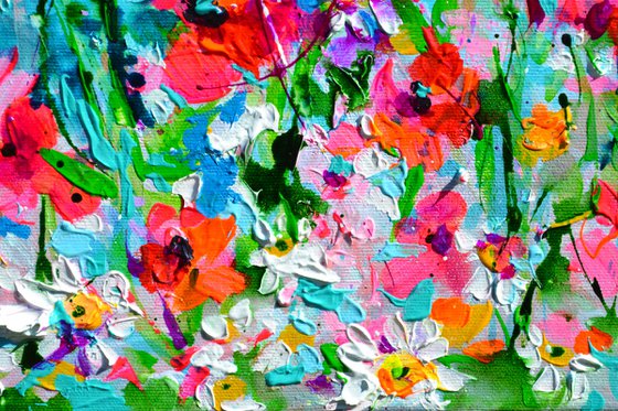 Wild Flowers and Poppies on the Seaside Cliff