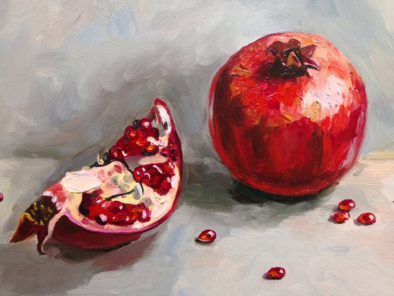 Ripe pomegranate with seeds still life 2