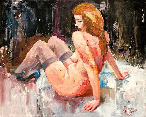 Nude on a dark background