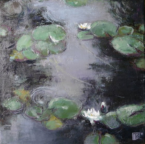 Whisper of white water lilies.