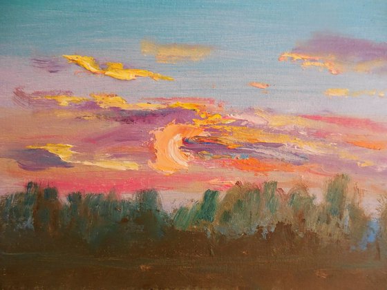 Pink sunset at the river. Plein air painting