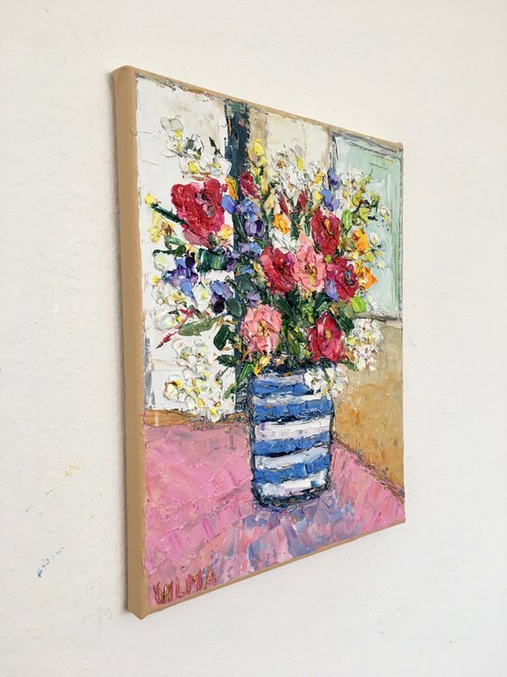 Striped vase with flowers