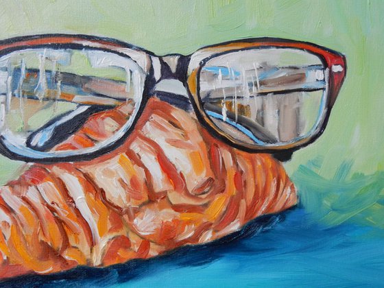 Croissant with glasses.