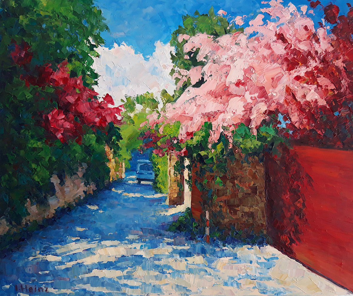 Backstreet with flowering trees by Irena Heinz