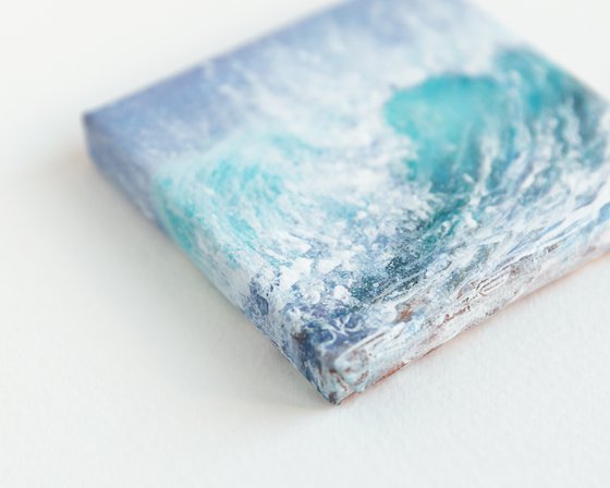 Miniature blue ocean waves