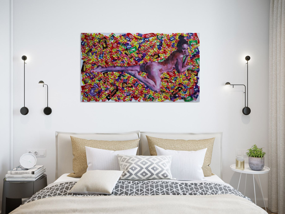 Nude woman painting with candy background