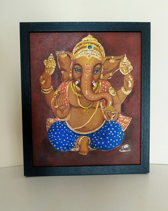 Lord Ganesh with blue eyes