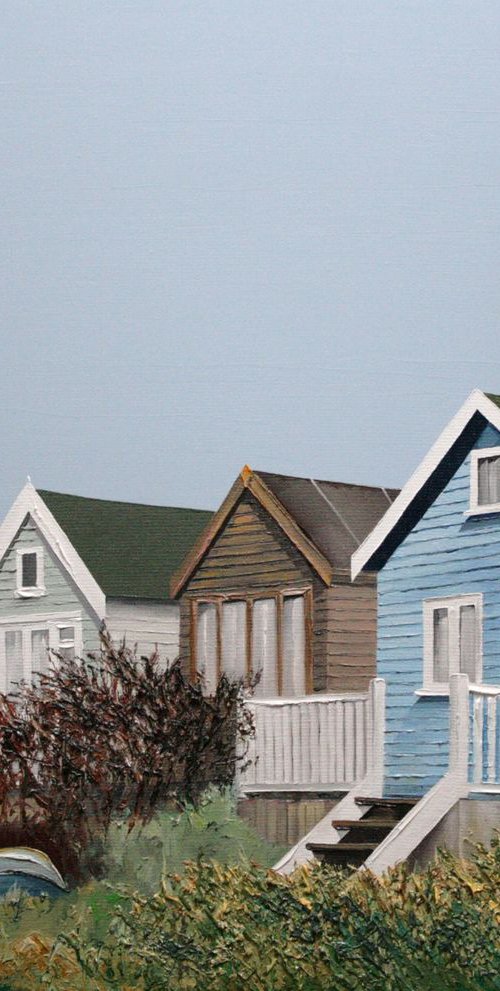 Beach huts in a row by Linda Monk