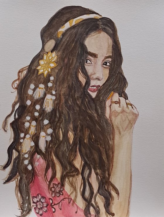 Ela en oro