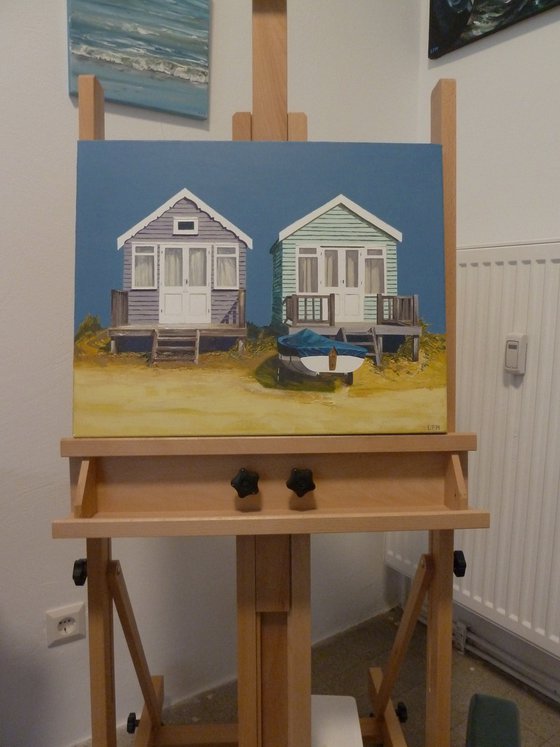 Two Beach Huts and Boat