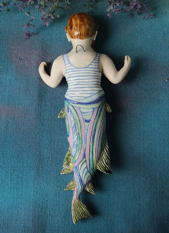 Hipster Merman,  Wall sculpture by Elya Yalonetski.