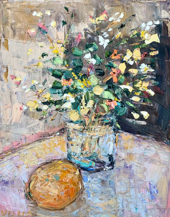 Still life with flowers and orange