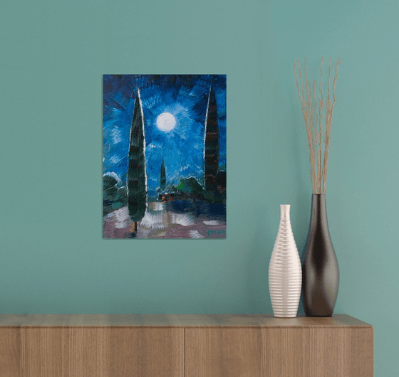 cypresses and a full moon