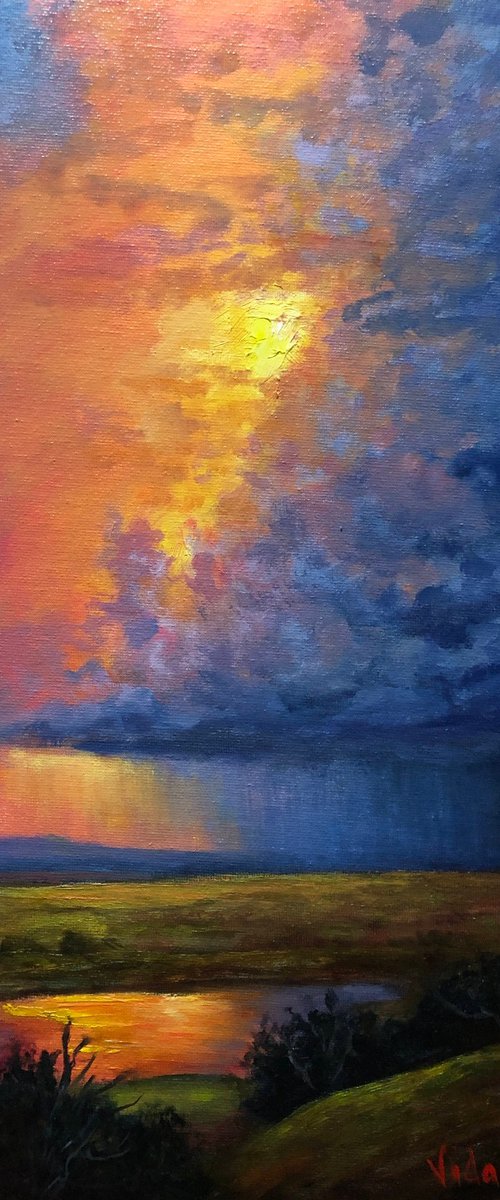 Last light on Storm Clouds by Christopher Vidal