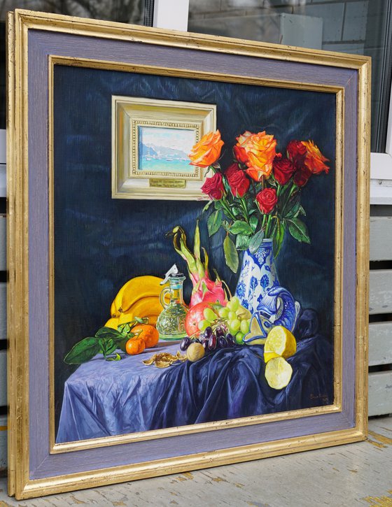 Roses in a ceramic vase and fruits