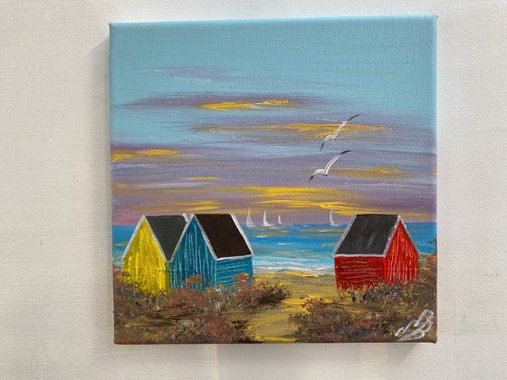 Three Beach Huts on the Beach