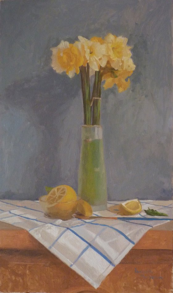 Yellow daffodils and limons