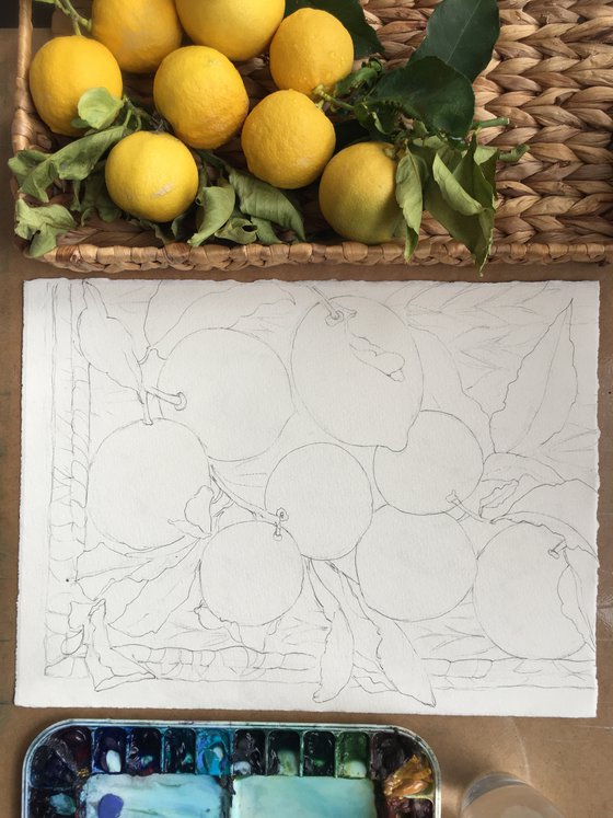 Lemons in a straw box