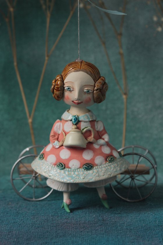 Little Girl with a teapot. Hanging sculpture, bell doll by Elya Yalonetski