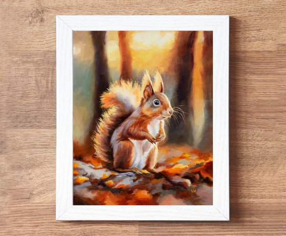 Red squirrel in autumn forest