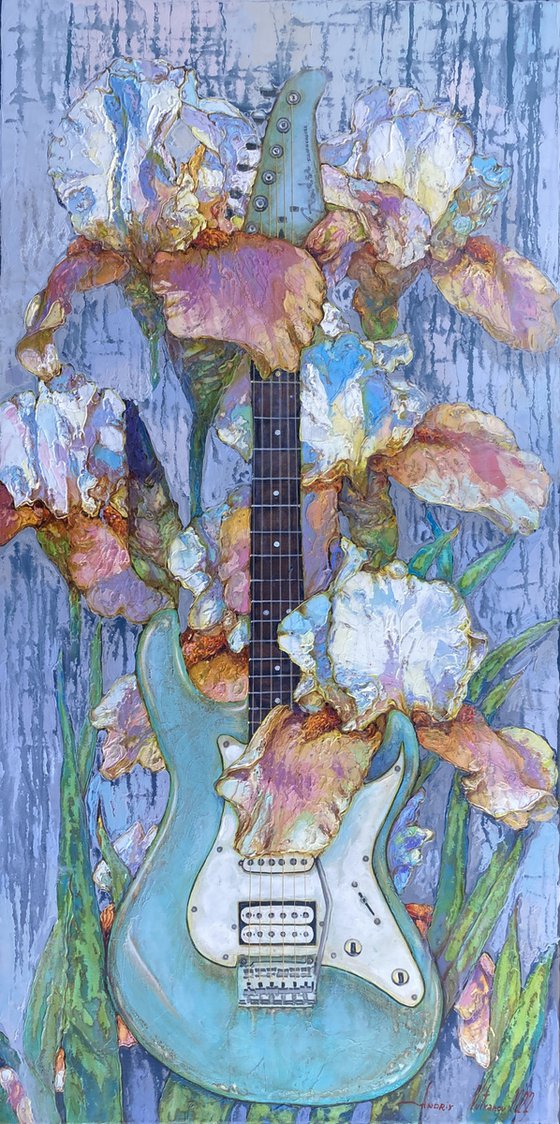 Guitar and flowers.