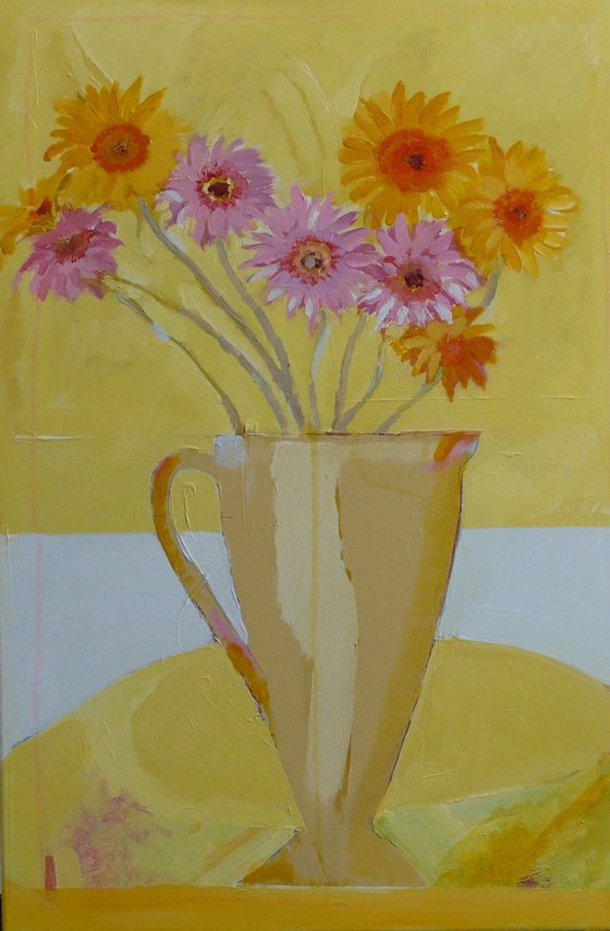 Gerbera flowers in old stone jug