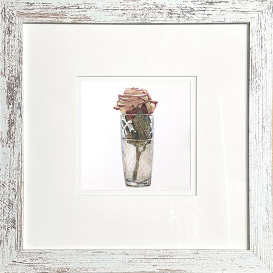 Rose in a faceted glass