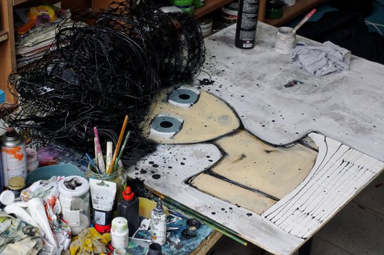 Girl Emerging From the Canvas