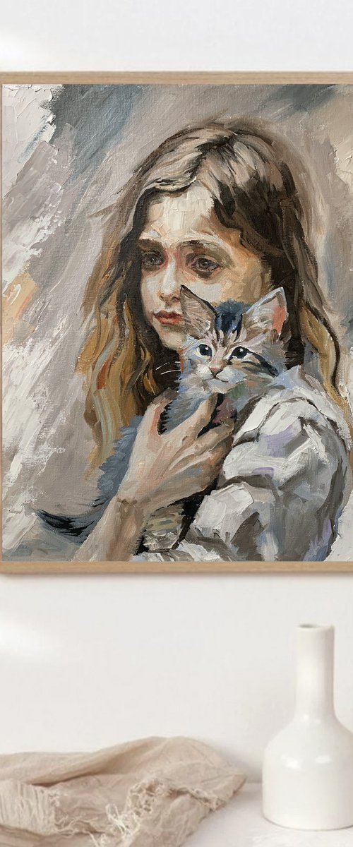 Girl with Maine Coon kitten by Vita Schagen