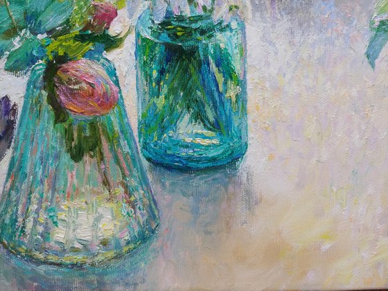 Flowers in blue glass
