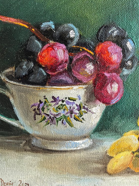 grapes in porcelain cup