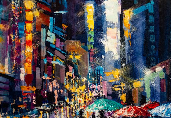 Night city lights, people with umbrellas