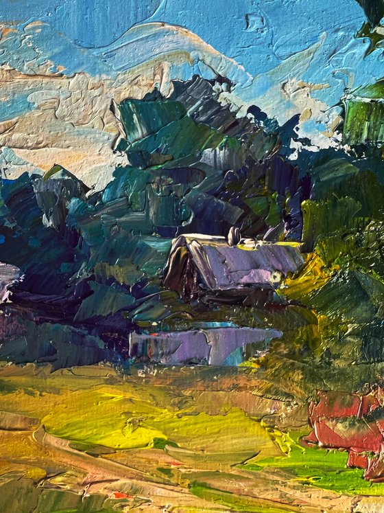 A Red Cow near the Houses