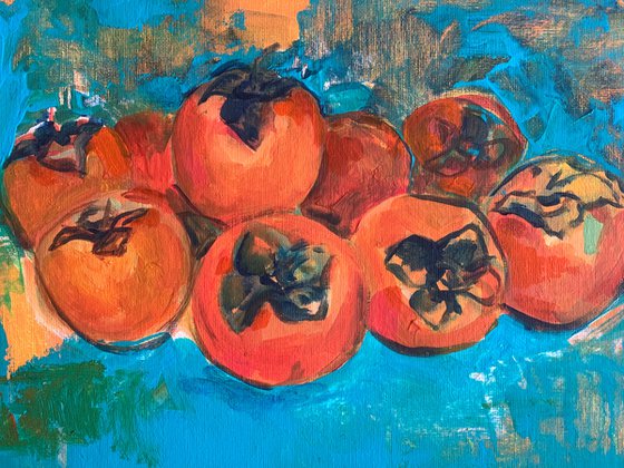 Persimmons on the table