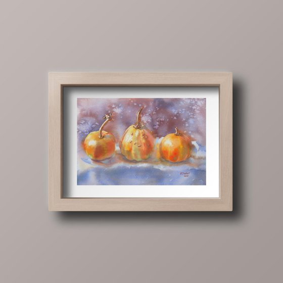 Three pumpkins. Winter Painting