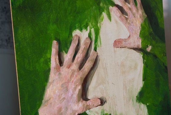 hands and green painting